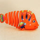 Műanyag felhúzható Wiggle Fish játékok